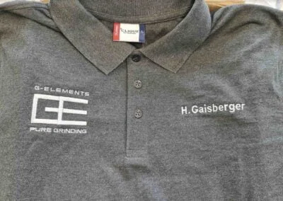 GE Poloshirts bestickt mit Namenbeschriftung