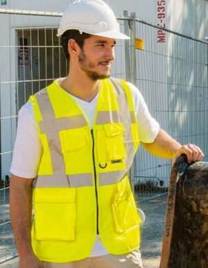 Executive Multifunctional Safety Vest Berlin ist die perfekte Wahl für Männer und Frauen, die nach hochwertiger und vielseitiger Arbeitskleidung suchen.